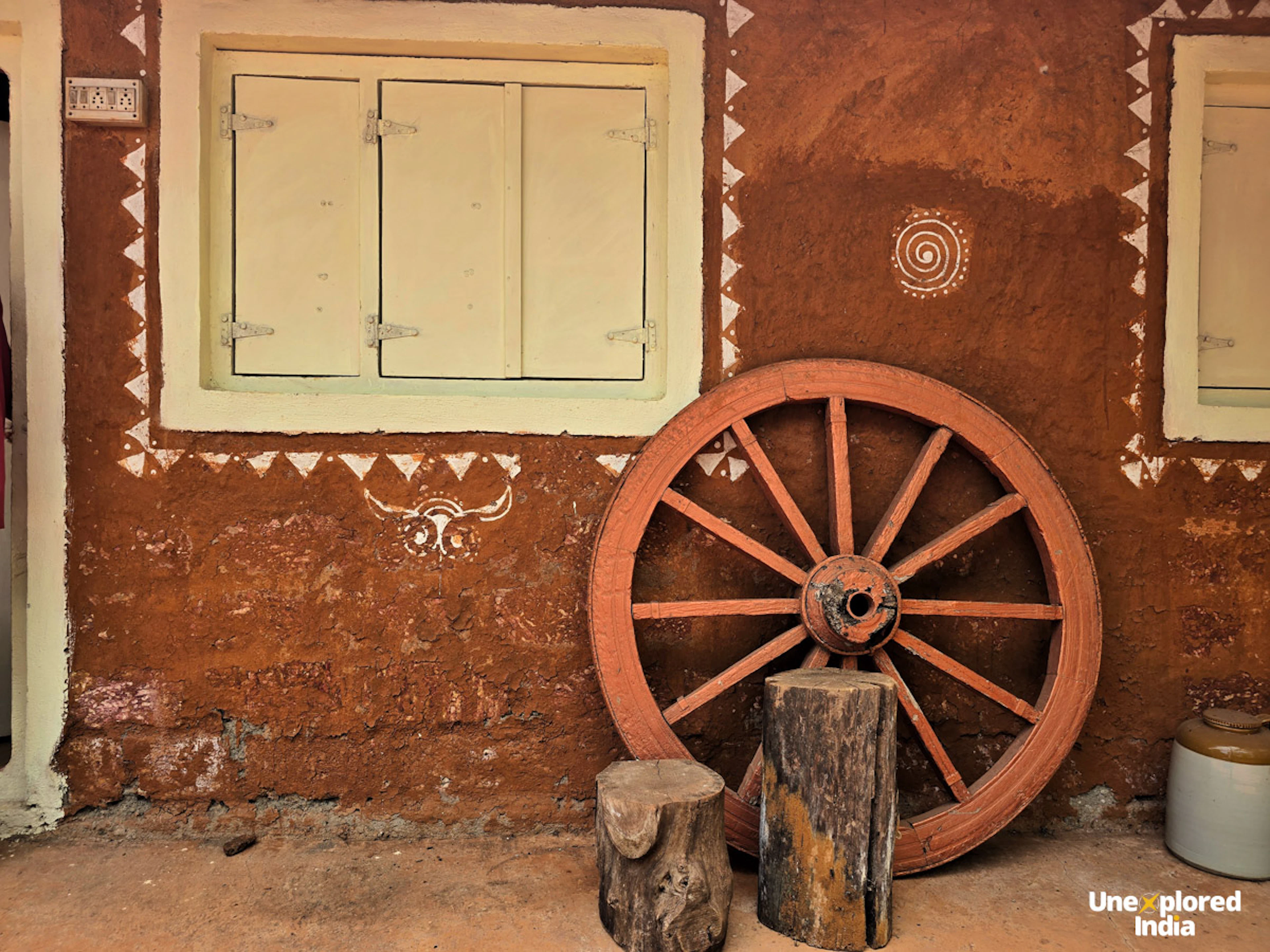 Konkan villages — traditional home with painted walls and wooden decor