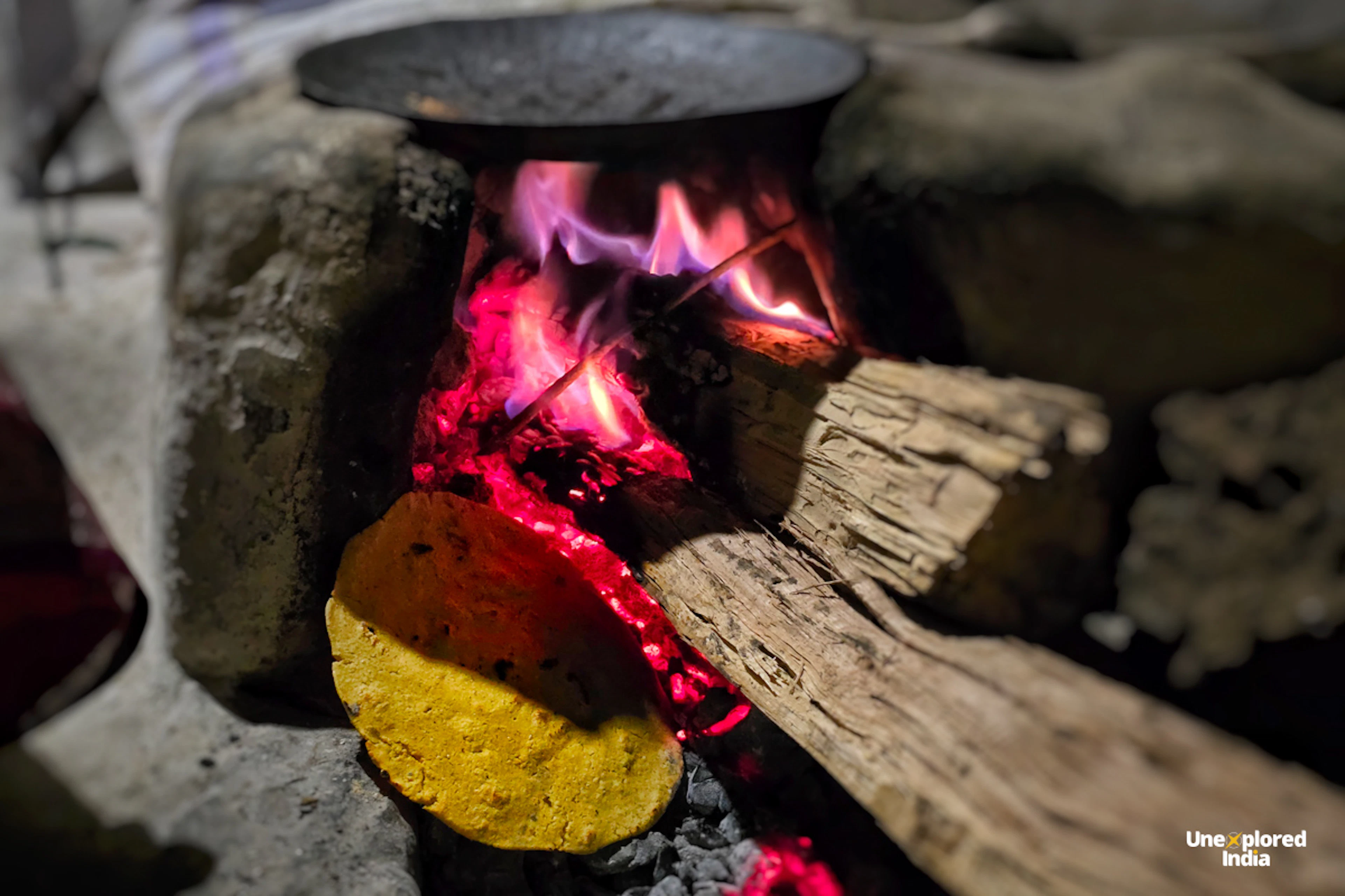 Traditional cooking at a Chimtipur village homestay with local food being prepared in a rural kitchen in Madhya Pradesh