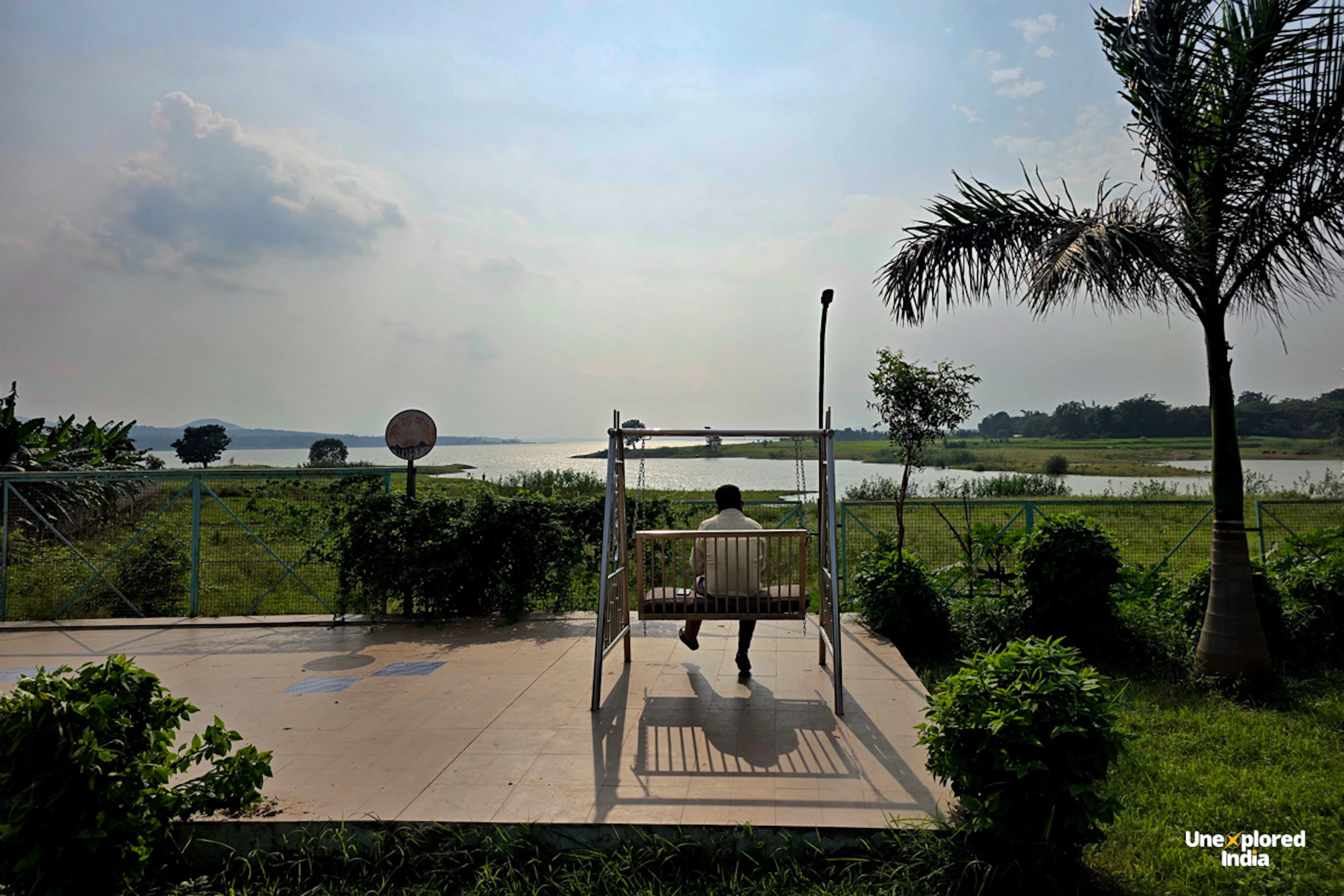 Scenic sunset view of the river and surrounding Satpura landscape from Madhai village stay in Madhya Pradesh