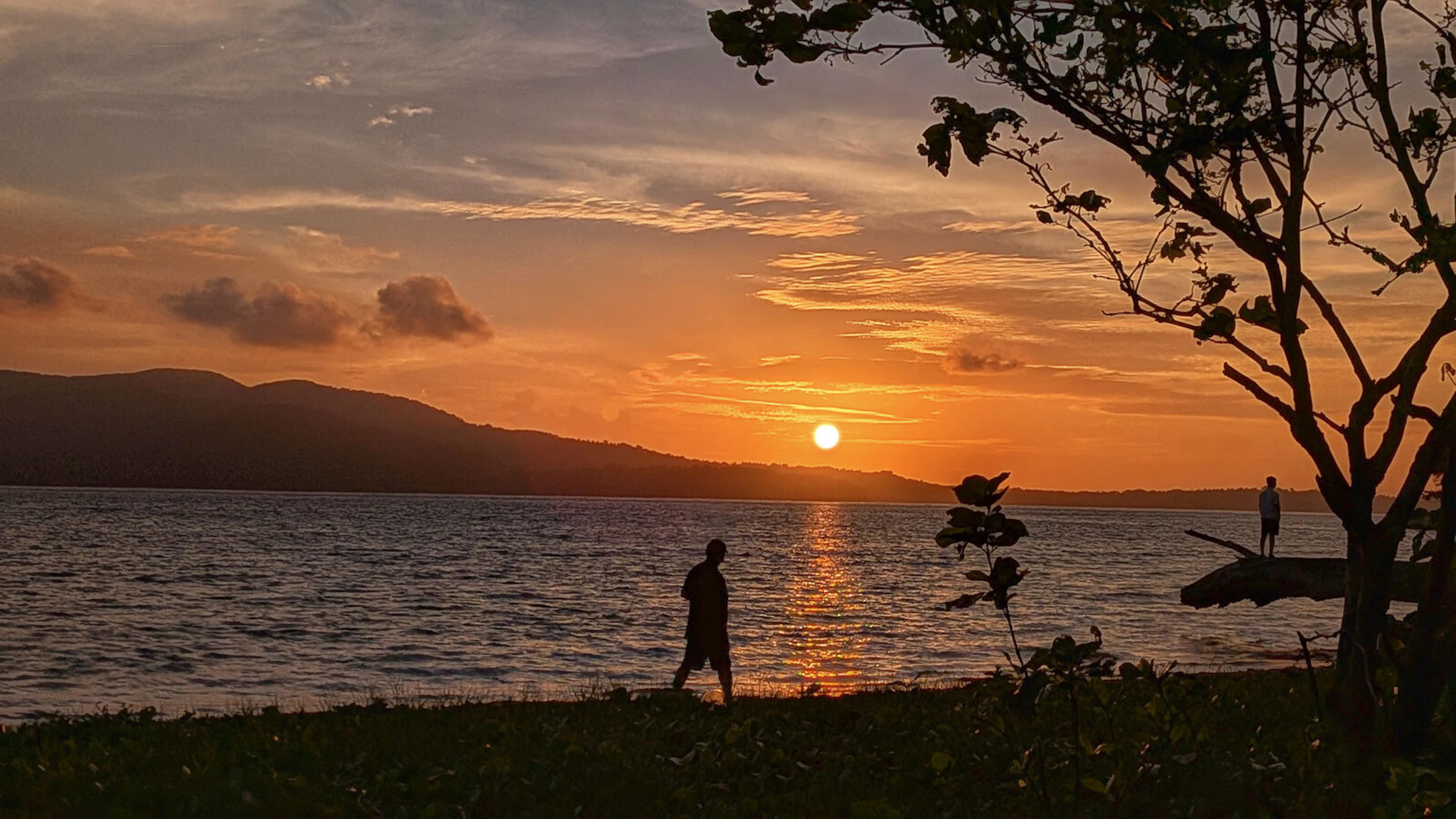 sunset by a beach on long island andamans beach trip