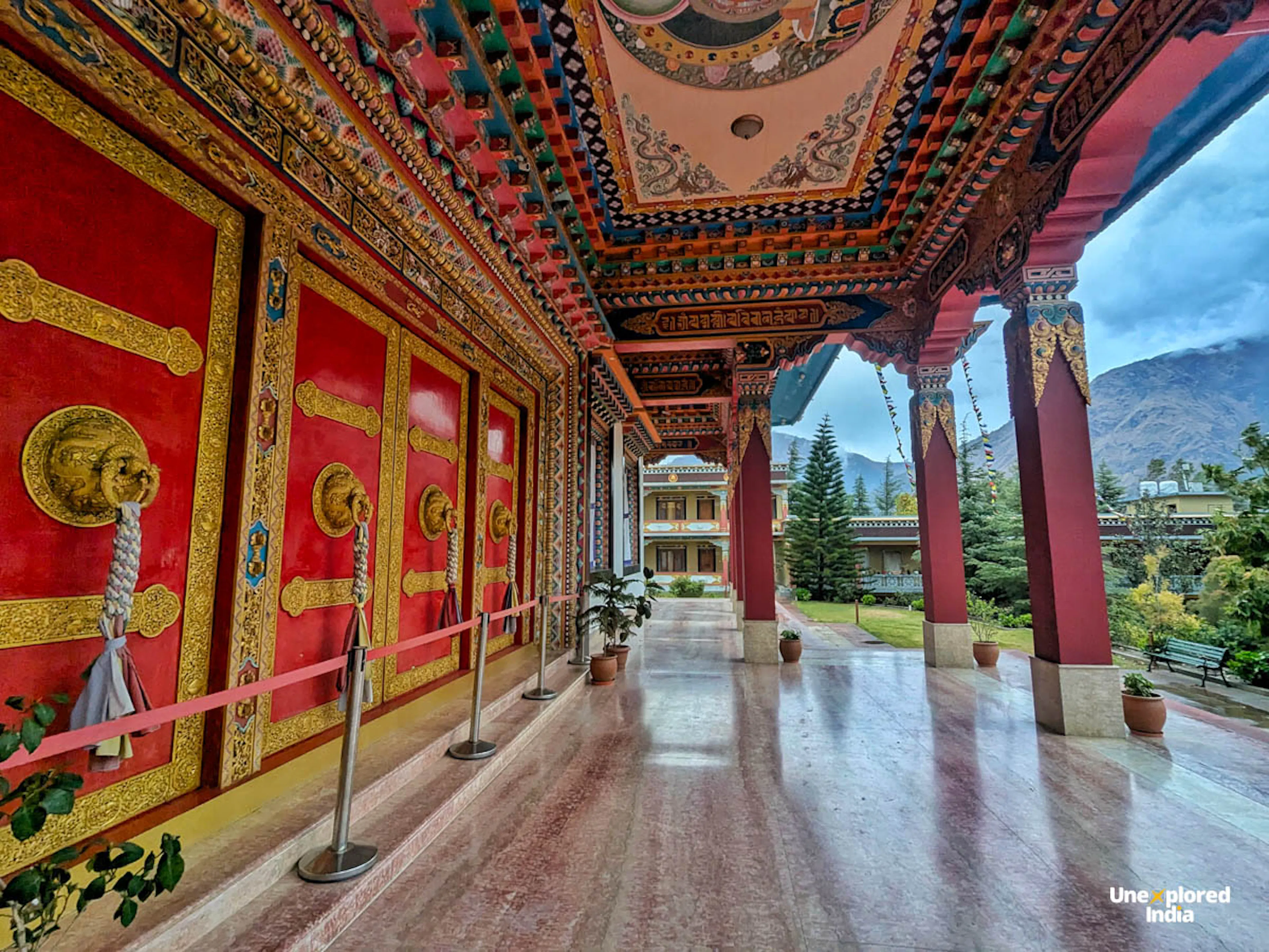 buddhist monastery alleyway vibrant red