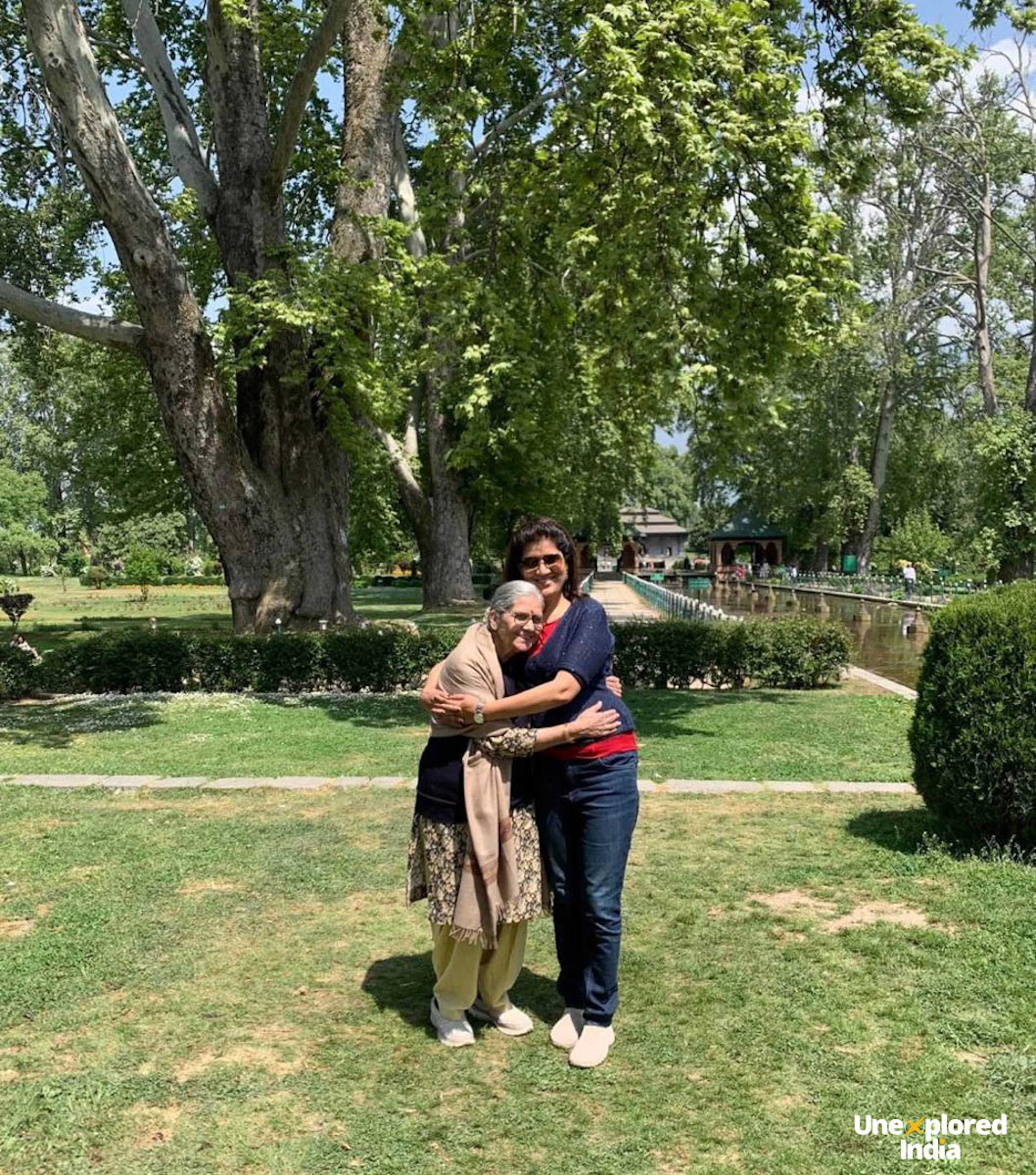 Traveler hugging her mother on a trip to Srinagar