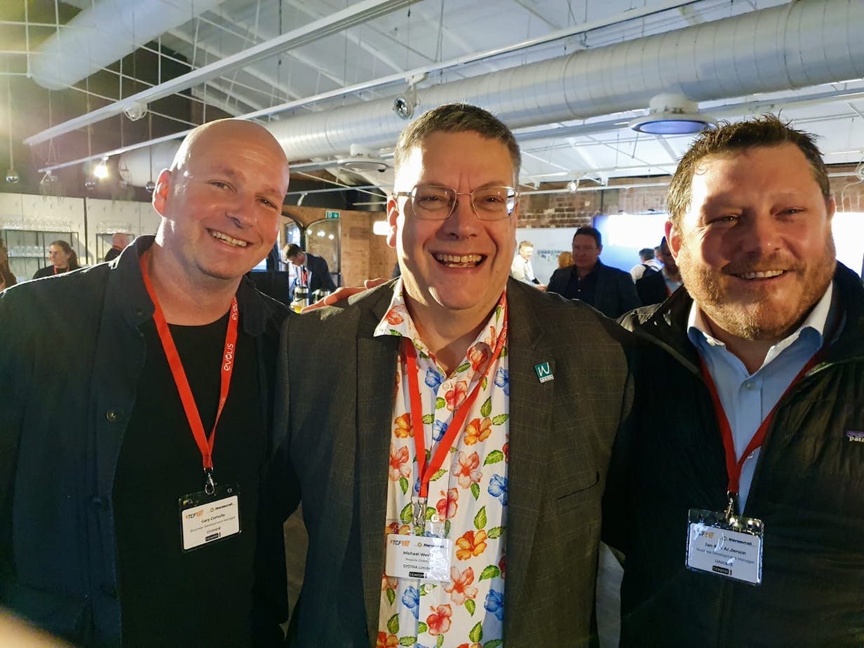 Gary Comolly (left) and Jan-Erik Anderson (right) with Michael Wevill, Projects Director at Systra, at Smartex TCF23 