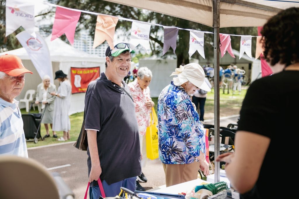 Seniors discuss assistive technology aids for independent living with Unicare Health