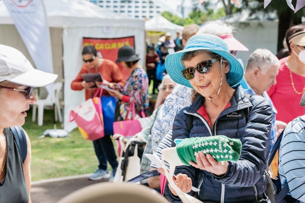 Seniors try out fall prevention socks and sock and stocking aids from Unicare Health