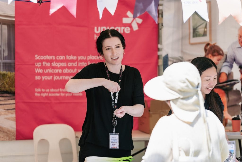 Unicare Health team demonstrates daily independent living aids for home care