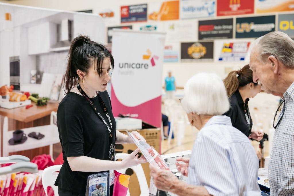 Seniors engage with #safeseniors assistive technology display at Rockingham Seniors and Carers Expo 2023