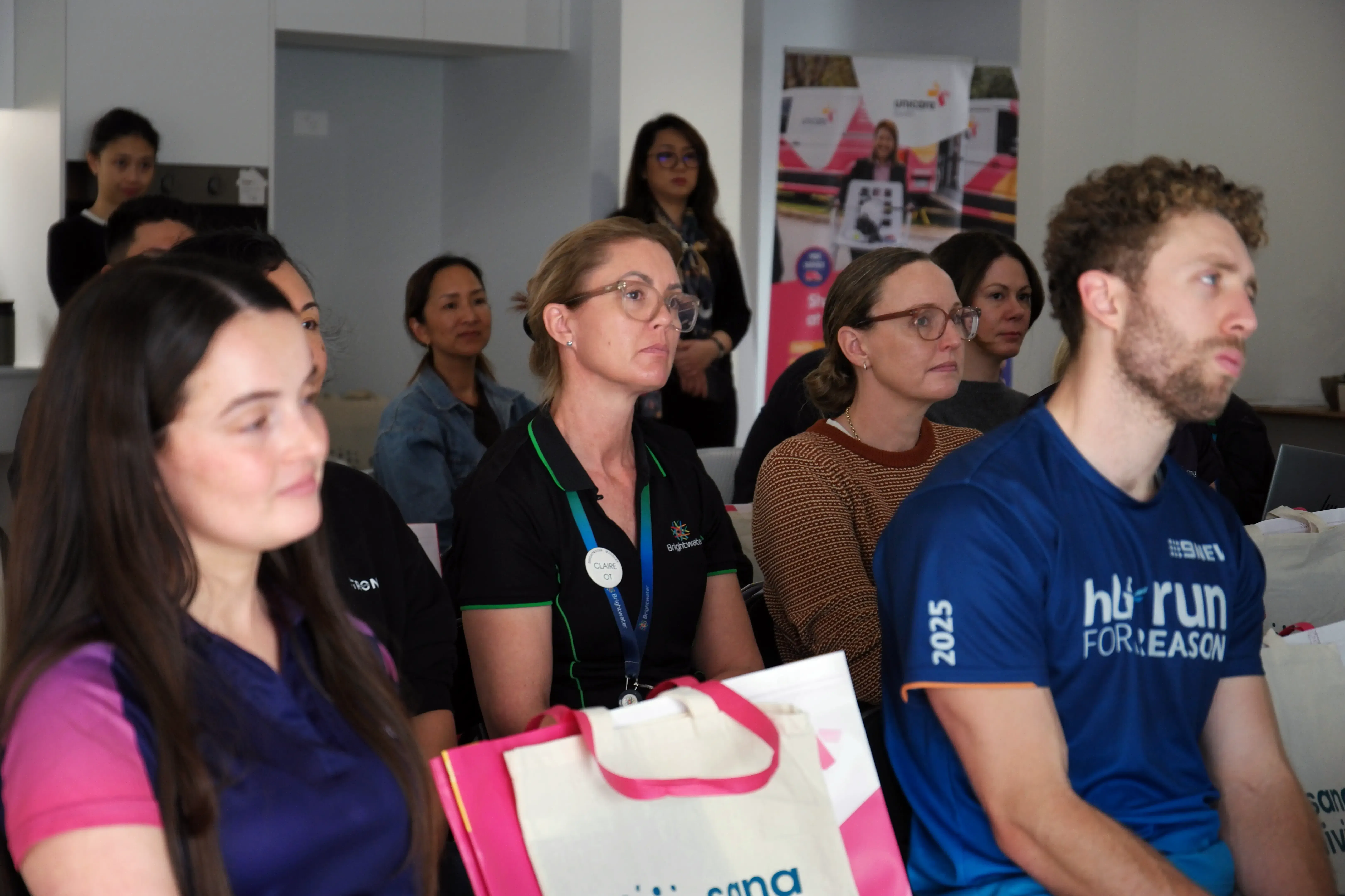 Attendees listening to a presentation during the Unicare Health and Sana Living assistive technology education session in Perth.