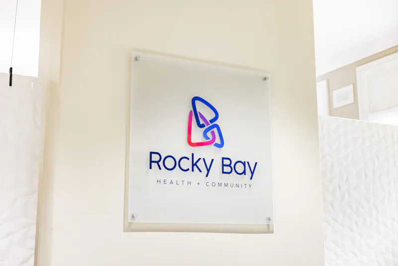 Rocky Bay Health and Community signage at Lady Lawley Cottage in Cottesloe, Perth accessible accommodation facility