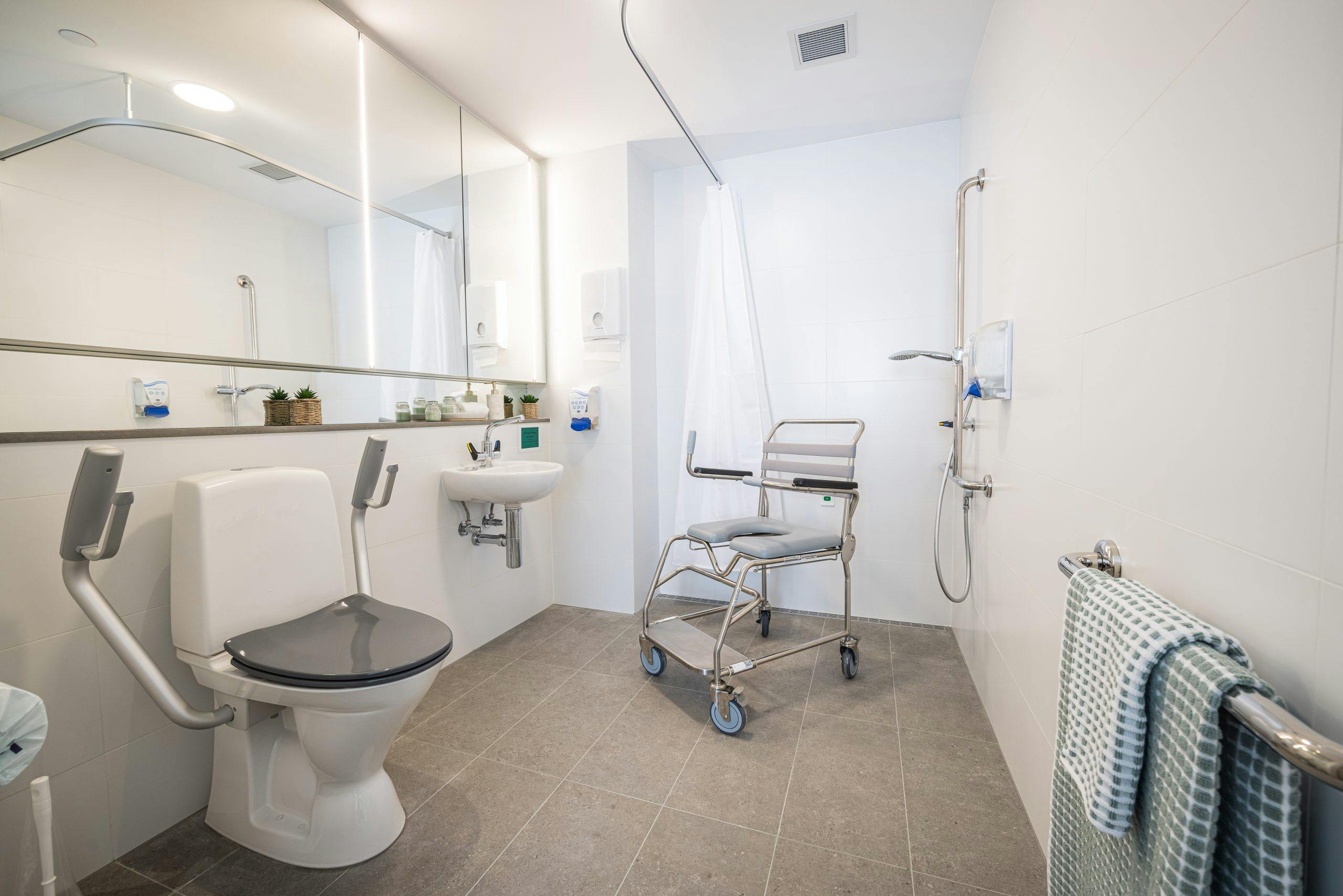 Middle Swan Residential Care aged care bathroom equipment fit-out with shower commode