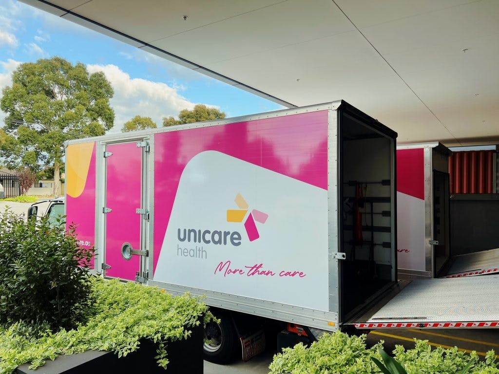 Unicare Health new delivery truck being loaded with assistive technology