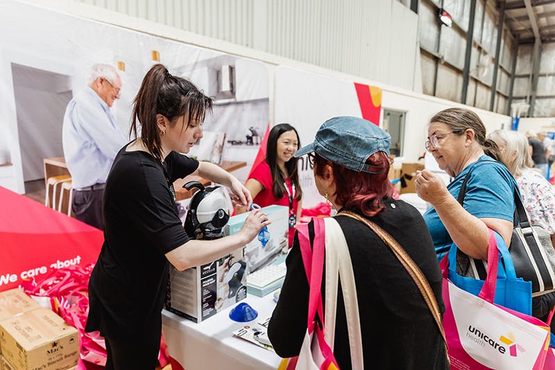 Unicare Health displays tippable kettle with kitchen safety aids at Have A Go Day Rockingham 2023