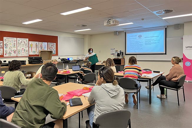 Annette holding an Equagel cushion
