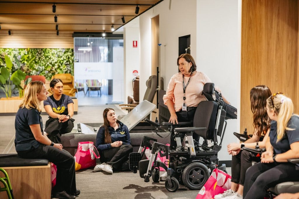 Superyou Therapists listen to Unicare's clinical educator discuss wheelchairs in Open Showroom Session