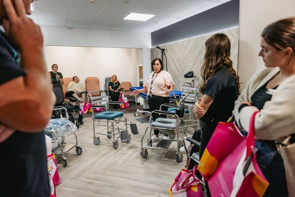 Occupational Therapists from Superyou listen to Unicare's clinical educator discuss shower commodes in Open Showroom Session