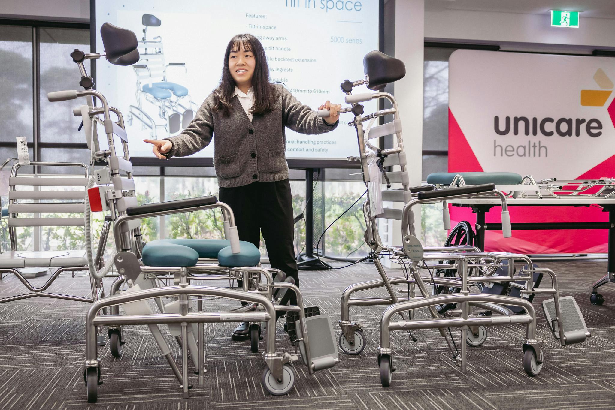 Clinical educator compares the differences in two tilt-in-space shower commodes