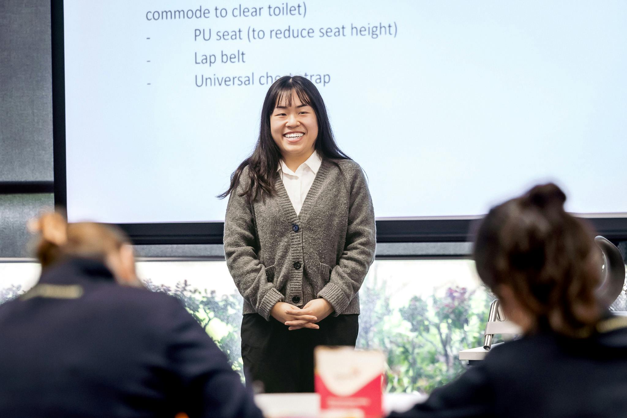 clinical educator happily presents shower commode prescription workshop