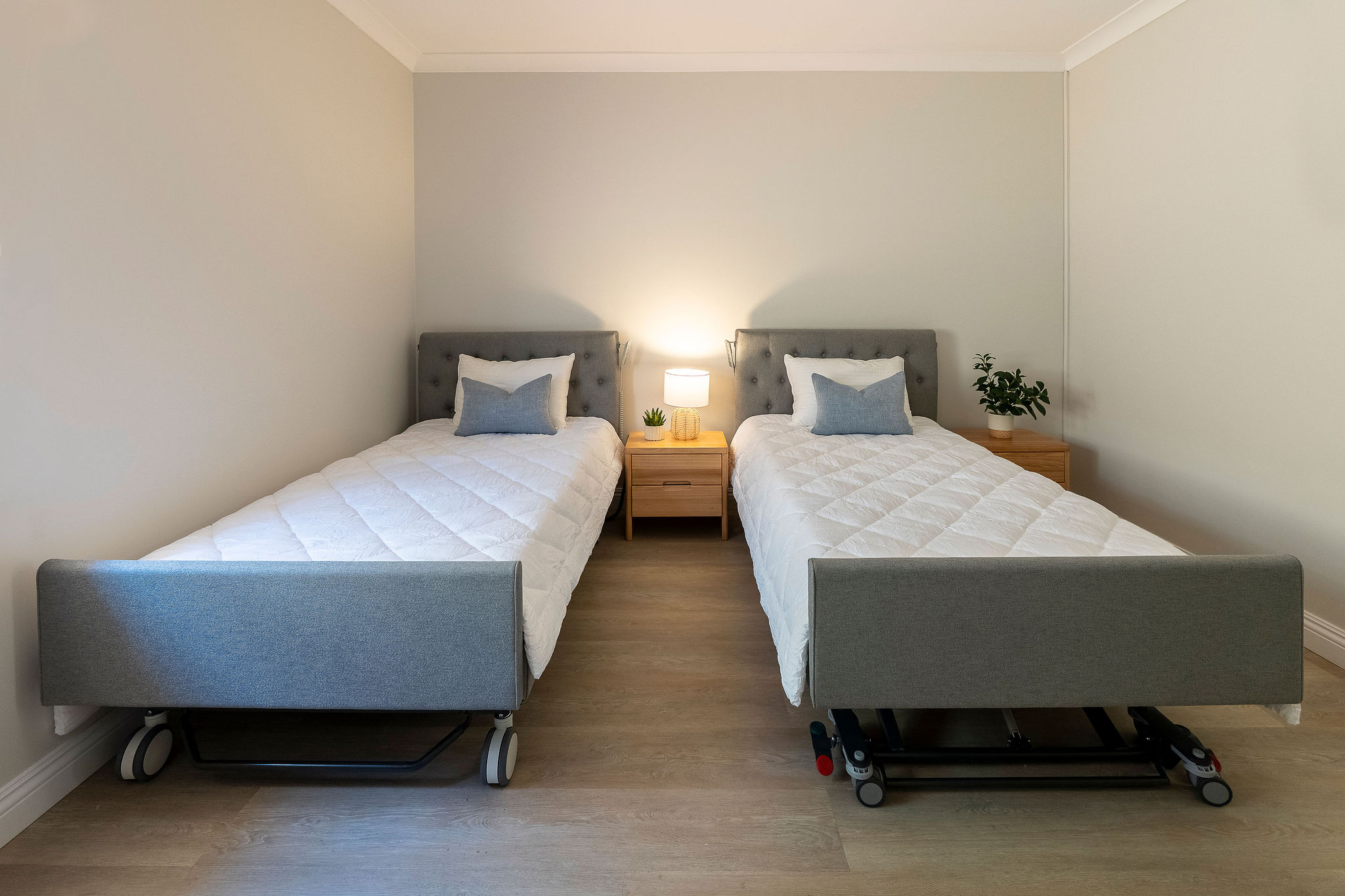 Twin accessible beds in disability-friendly bedroom at Lady Lawley Cottage Cottesloe, Perth short stay accommodation with mobility support features