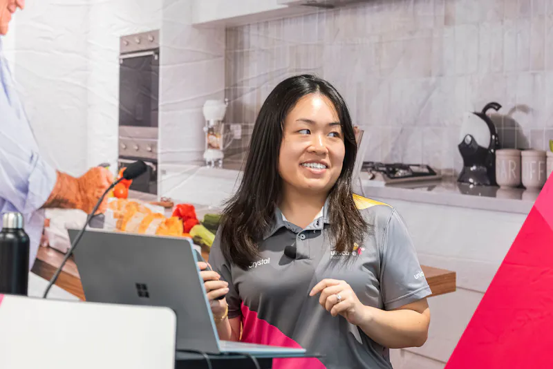 Crystal Chan from Unicare Health presenting on bathroom mobility and shower commode prescription during CPD training workshop in Perth WA