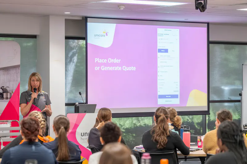 Unicare Health presenter demonstrating MyUnicare ordering and quoting system during CPD training workshop for Occupational Therapists in Perth WA