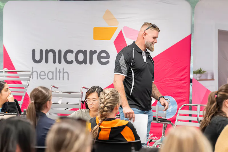 Michael Brown from Aces High Plumbing and Gas presenting on bidet solutions during Unicare Health bathroom mobility training workshop in Perth WA