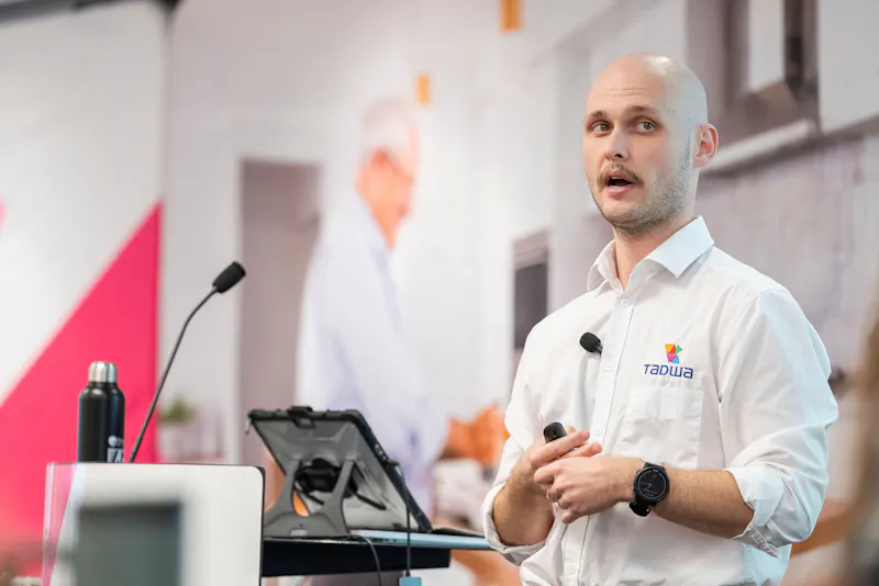 Max Macknish from TADWA presenting on bathroom modifications and NDIS pathways during Unicare Health training workshop in Perth WA