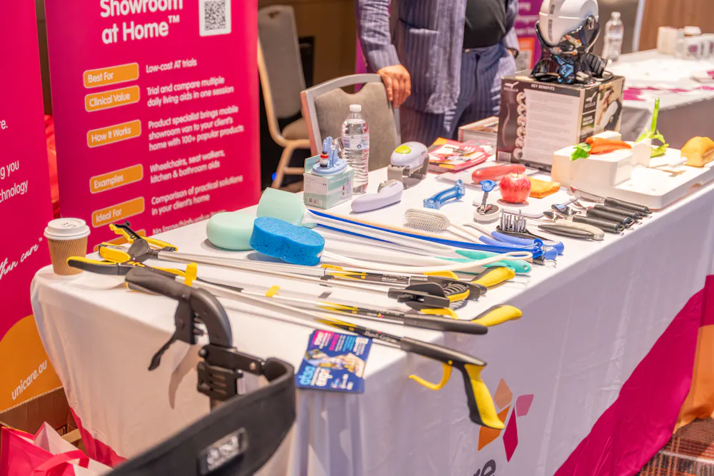 Unicare assistive equipment display at Bankstown Disability Expo NSW featuring daily living aids and Showroom at Home service at Canterbury League Club Belmore
