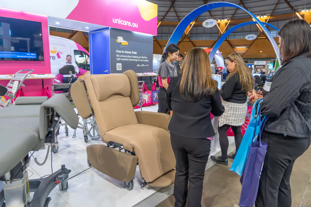 Pressure care chair displayed at the Unicare Health stand during the ATSA Independent Living Expo Sydney 2026.