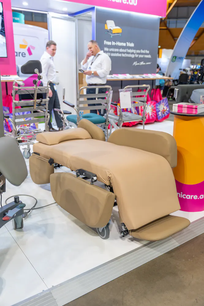 Pressure care chair displayed at the Unicare Health stand during the ATSA Independent Living Expo Sydney 2026.