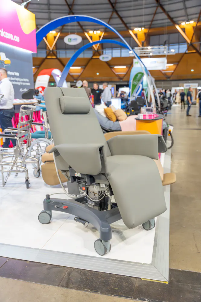 Procedure chair displayed at the Unicare Health stand during the ATSA Independent Living Expo Sydney 2026.