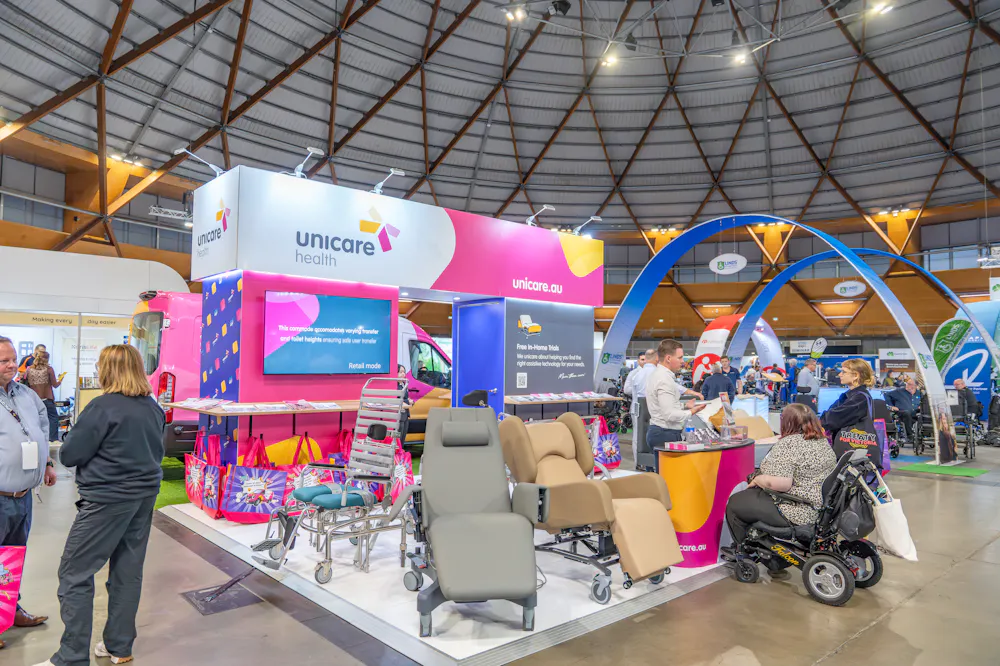 Unicare Health exhibition stand at the ATSA Independent Living Expo Sydney 2026 featuring assistive technology and pressure care equipment.