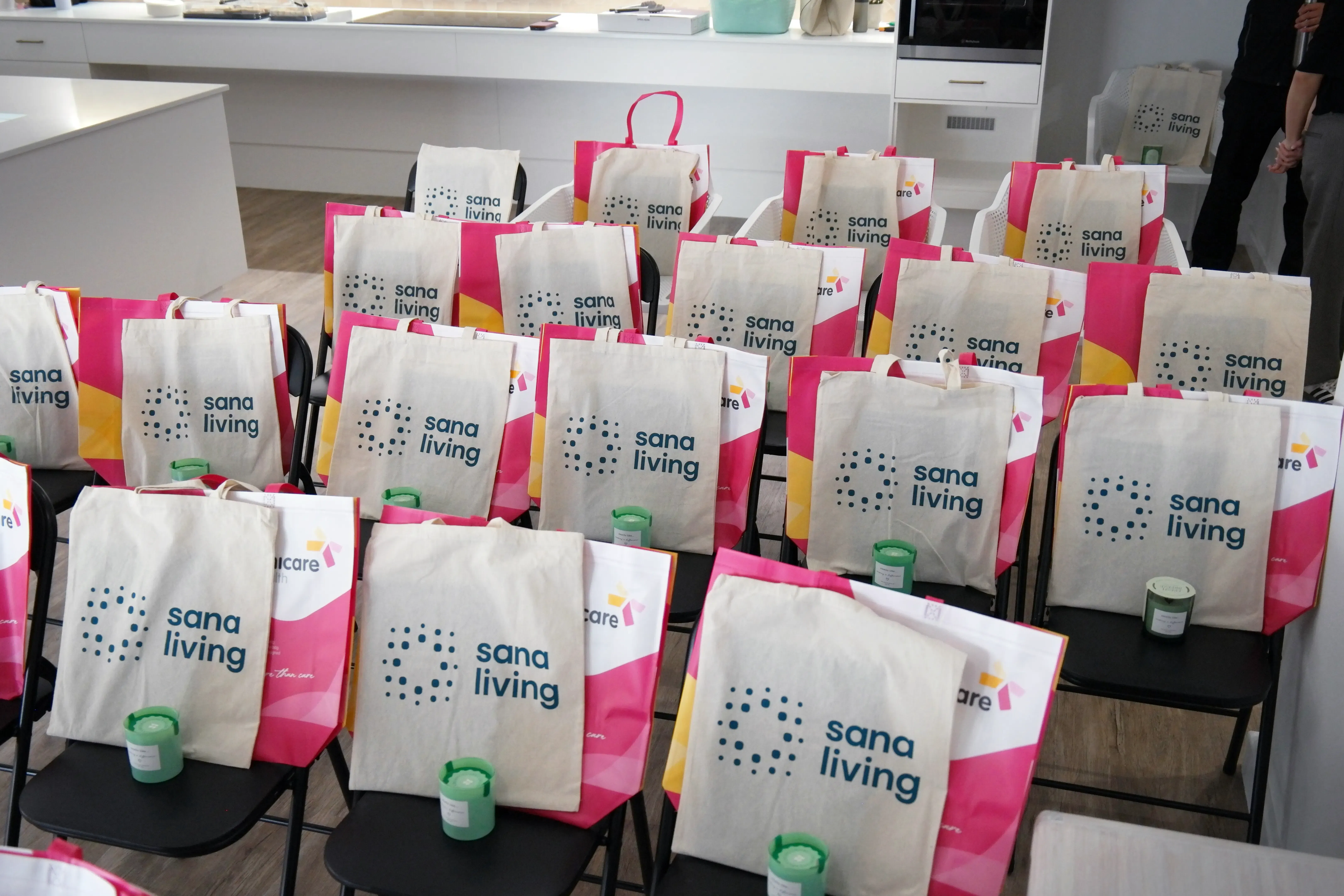 Welcome bags arranged in rows with event materials for education session attendees.