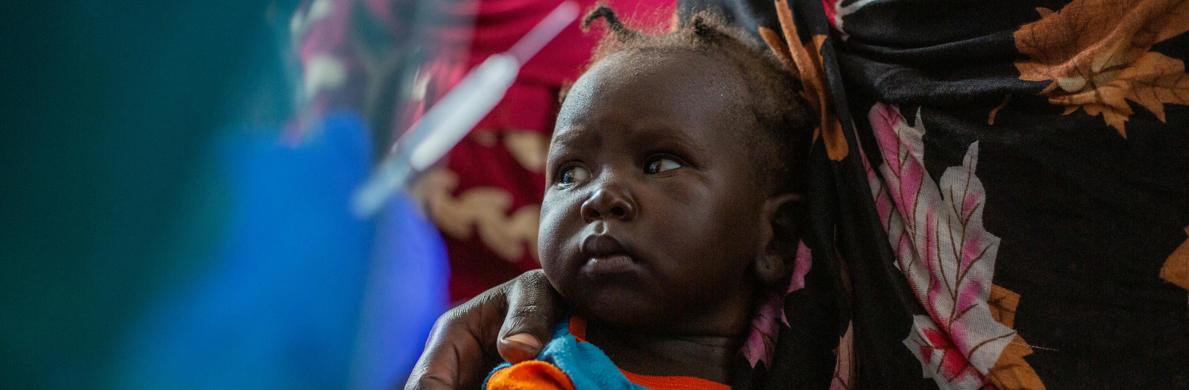 A child is vaccinated during the Accelerated Child Survival campaign supported by UNICEF and partners, in White Nile state.