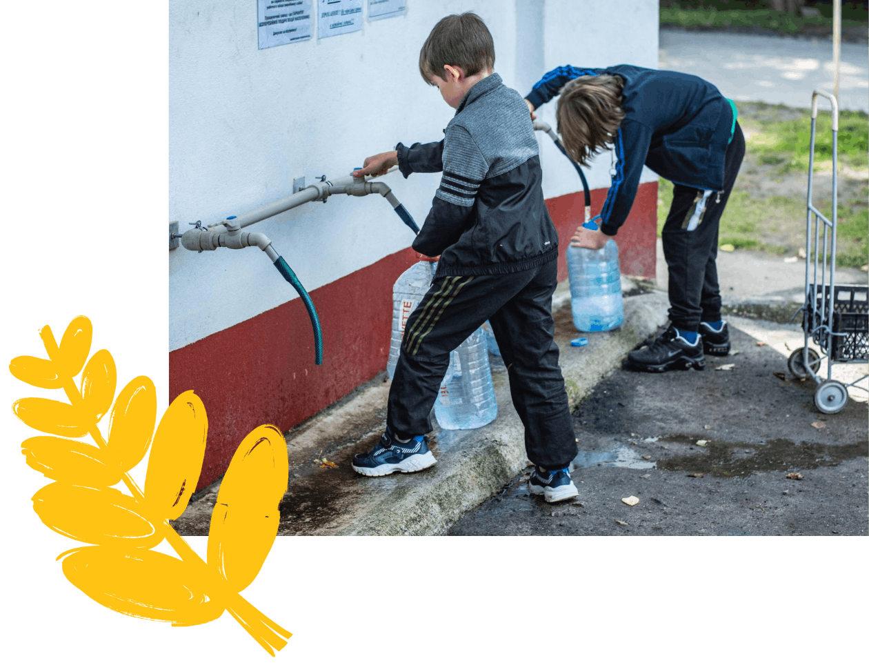 children filling water tanks from clean drinking water taps