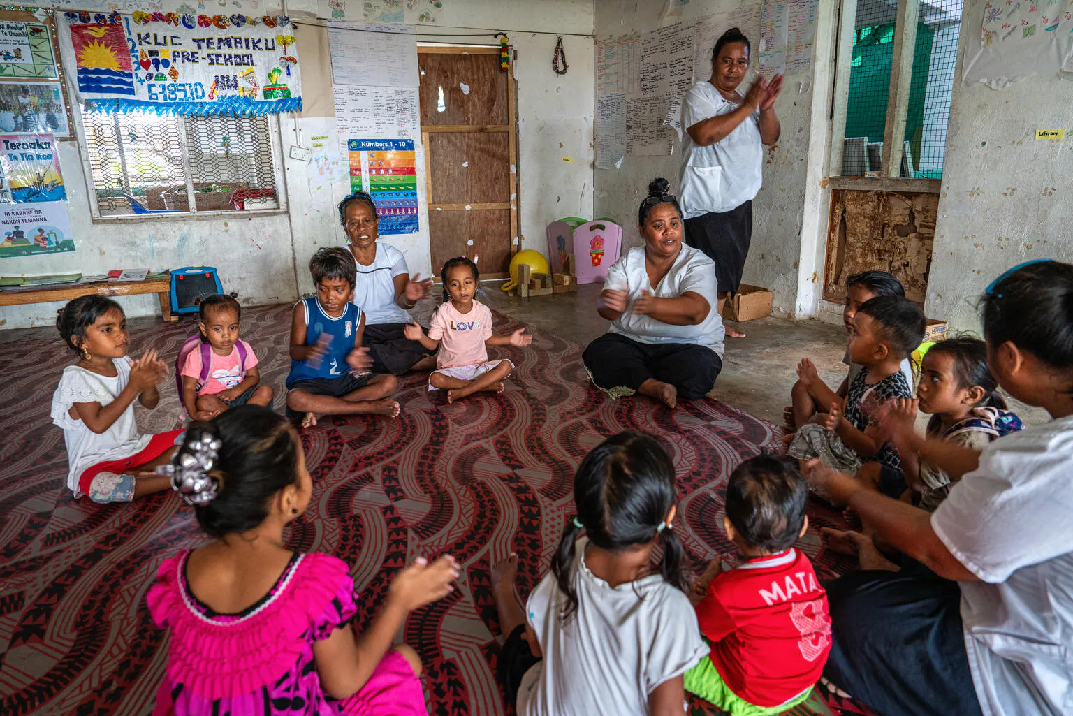 Students and teachers sing and dance at Kuc Tem'aiku Preschool in Tarawa, Kiribati.