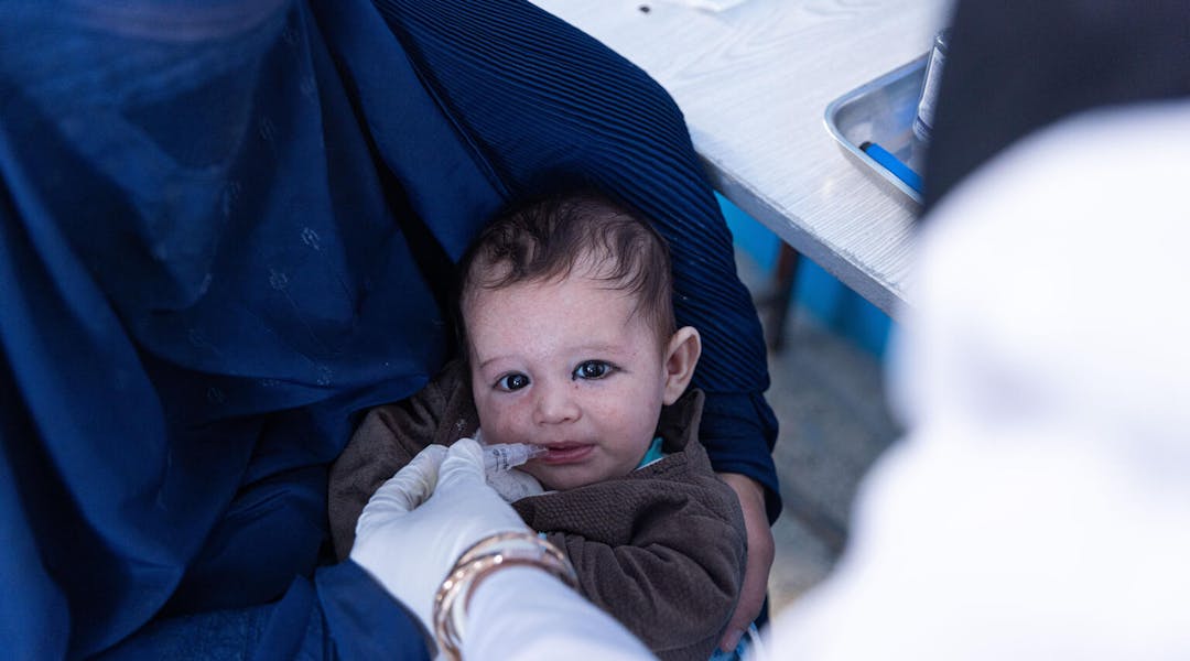 Afghanistan Emergency, Ali Sina (2.5 months) is vaccinated at the UNICEF-supported Noor Khoda Clinic in Mazar-e-Sharif, Afghanistan.