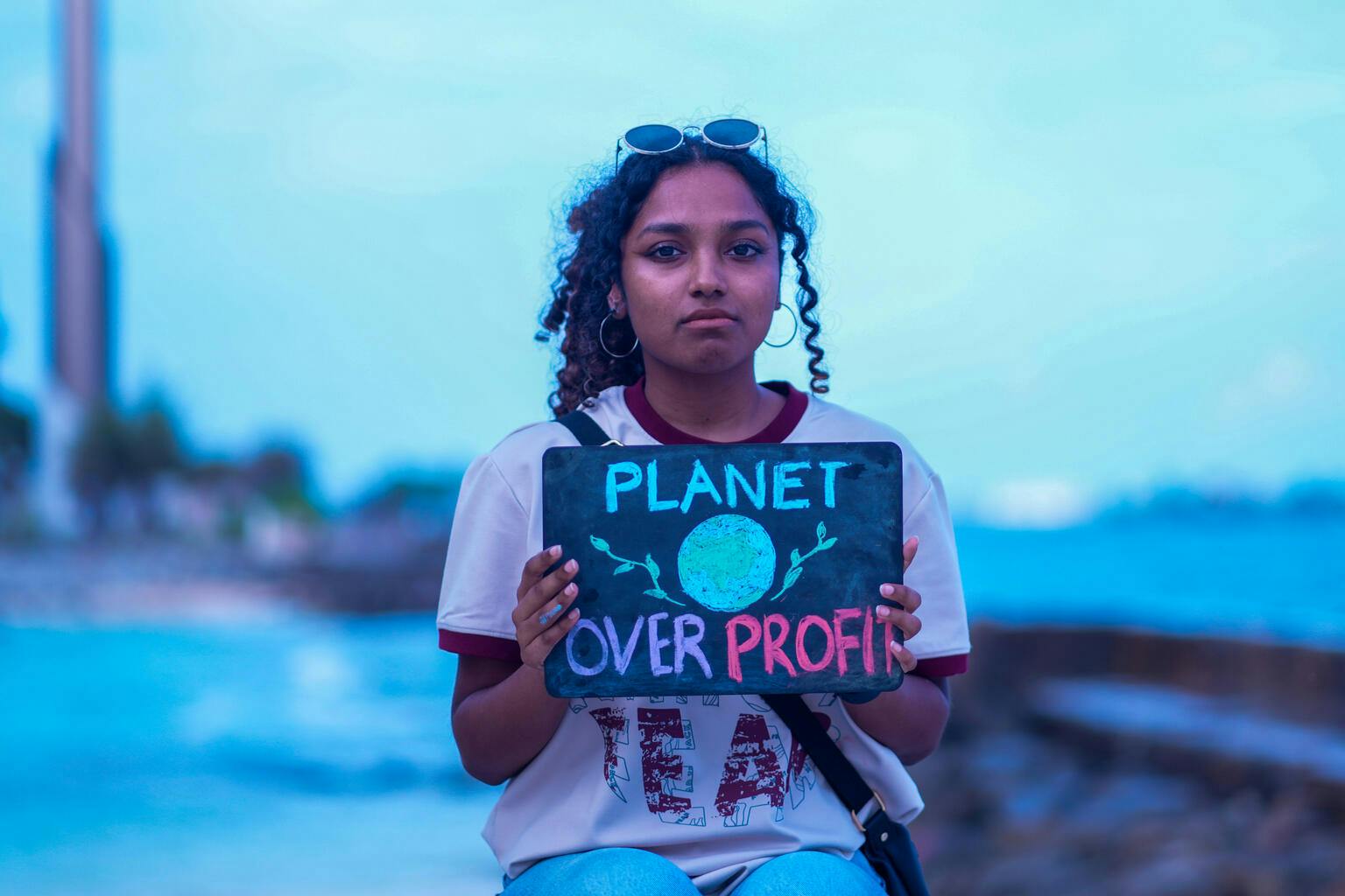 22-year-old Ainy Niyaz Yoosuf stands on an artificial beach in Malé.