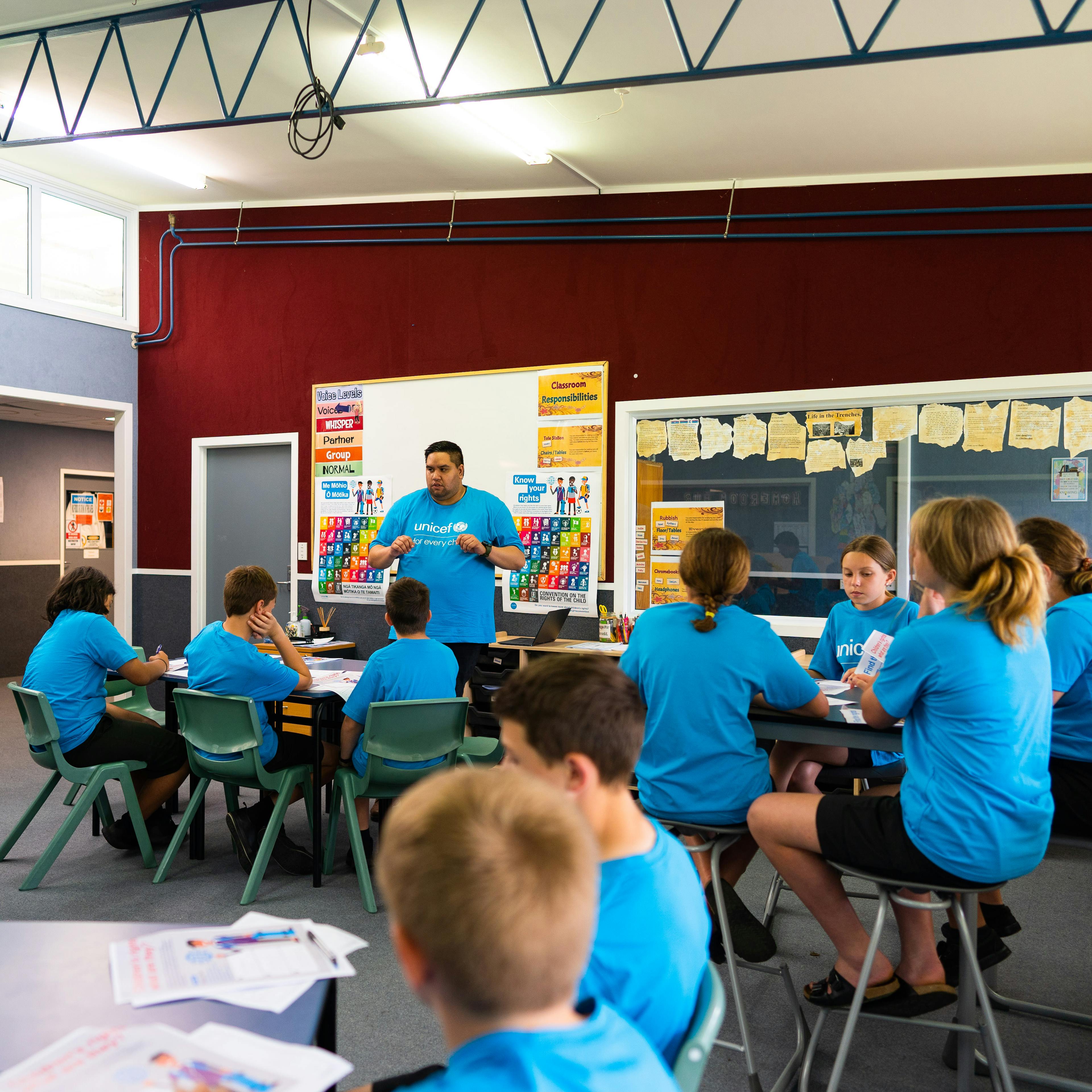 UNICEF employee Chris Coromandel talks to school students about educating them on their rights! 