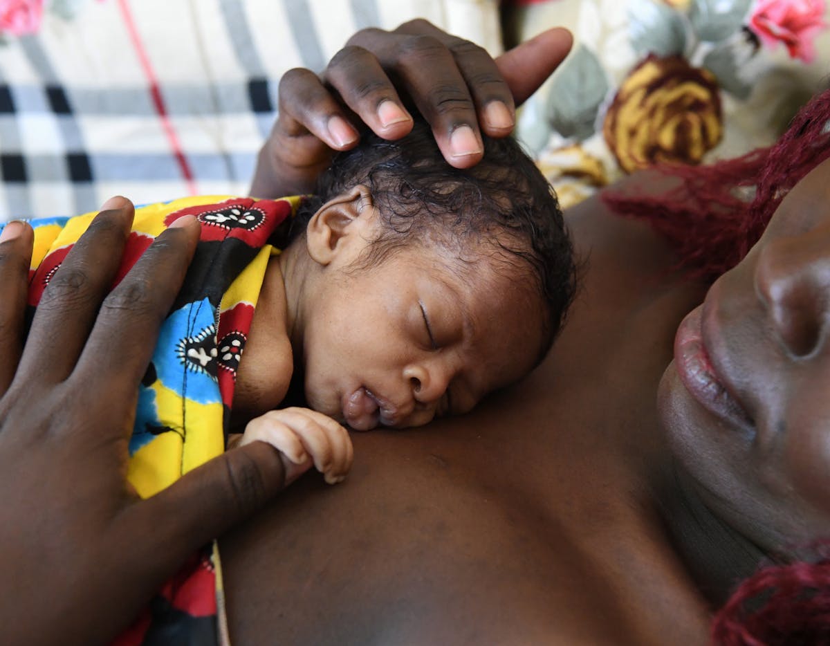 Health & Medicine- A 22 years old woman is practicing kangaroo care, in the health center “Mère et Enfant” in Ndjamena, the capital of Chad.