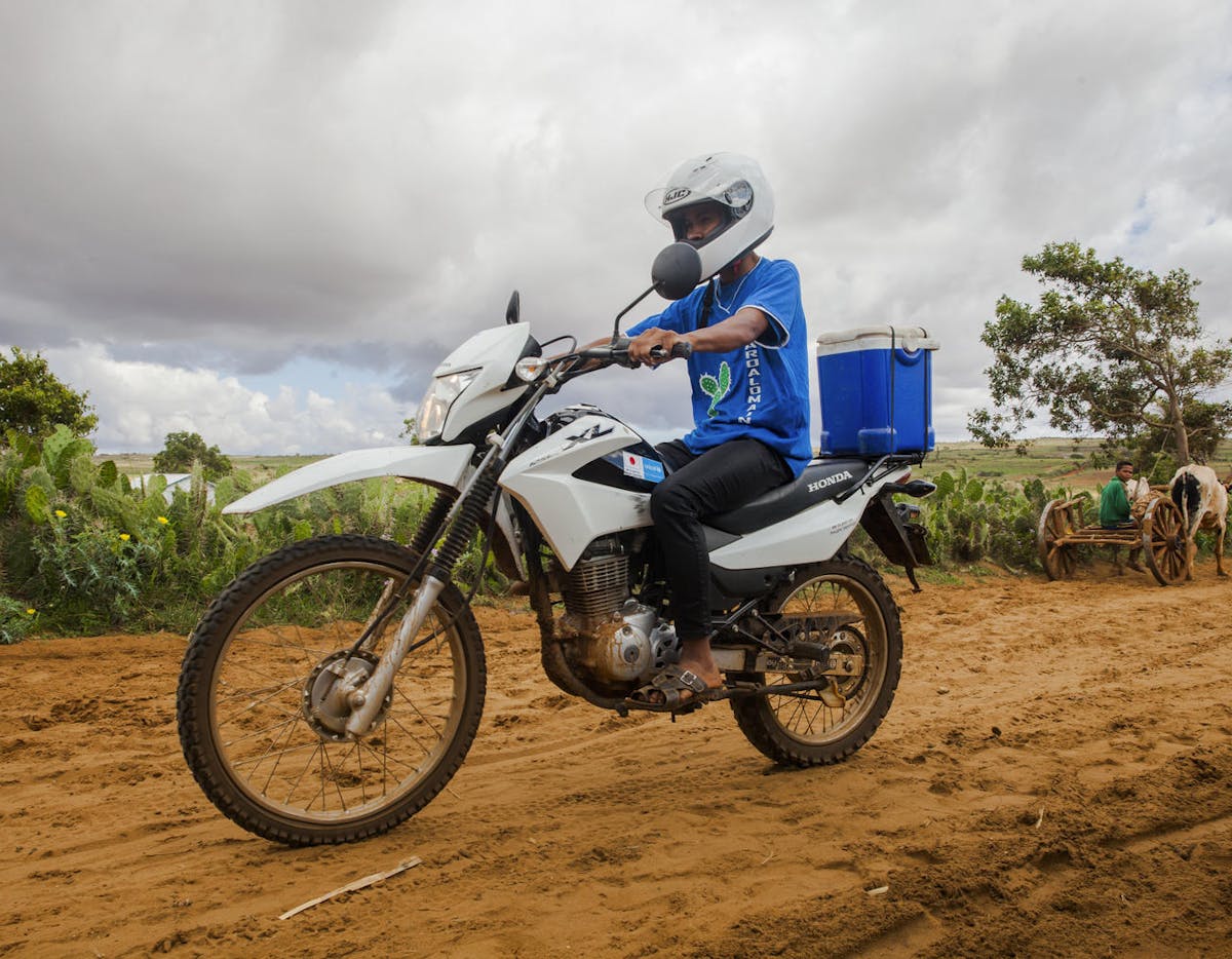 Immunisation - Motorbikes do door-to-door immunisations for kids in Madagascar.