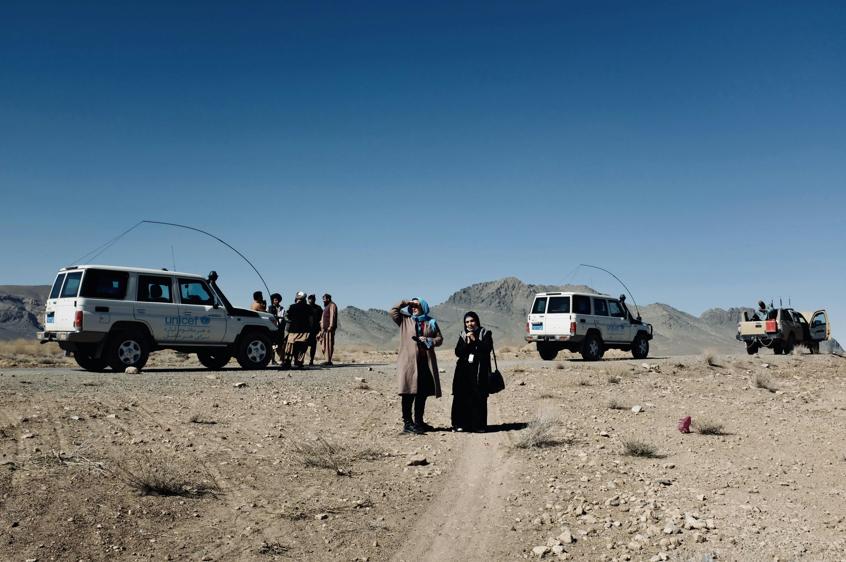 UNICEF Emergency Programme Manager Gillian Walker (left) and UNICEF Emergency Specialist Field Operations Ariana Achakzai during a rest stop halfway between Kandahar City and Tarinkot District, in Uruzgan Province.