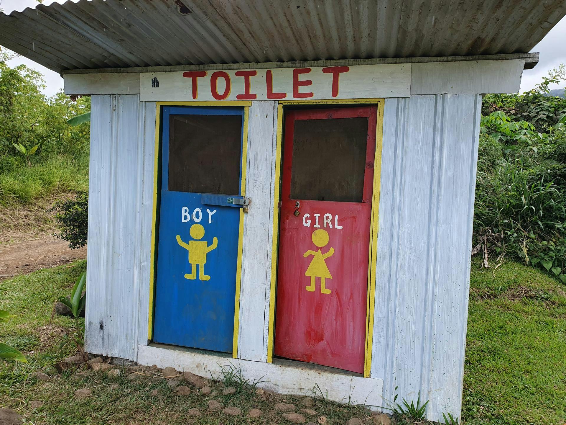 Boys and Girls Pit toilets in Hobu early childhood centre, which have been replaced with new flushing toilets as part of UNICEF’s Programme.