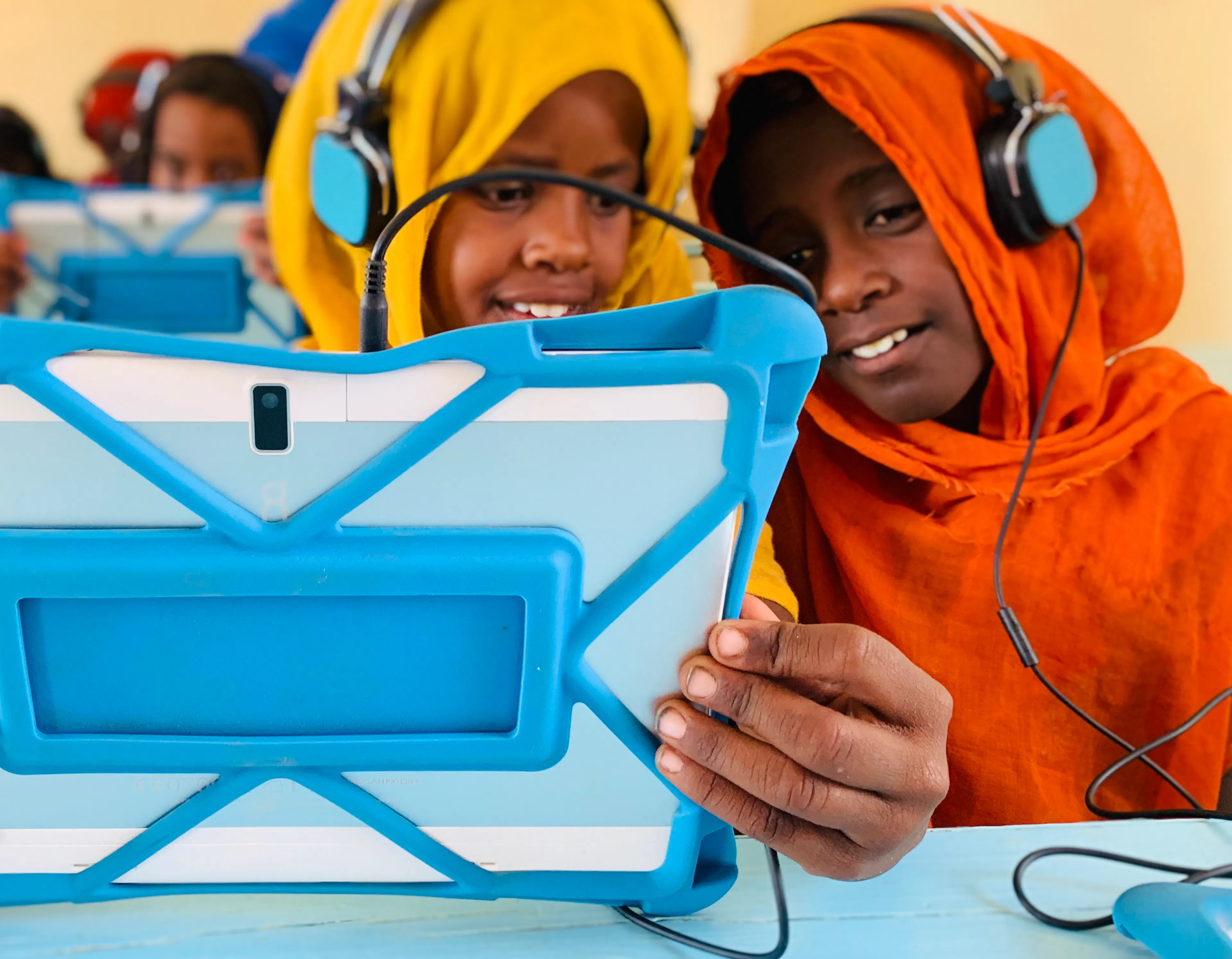 Girls attend e-learning classes in a centre in a small village in Kassala, Eastern Sudan.
