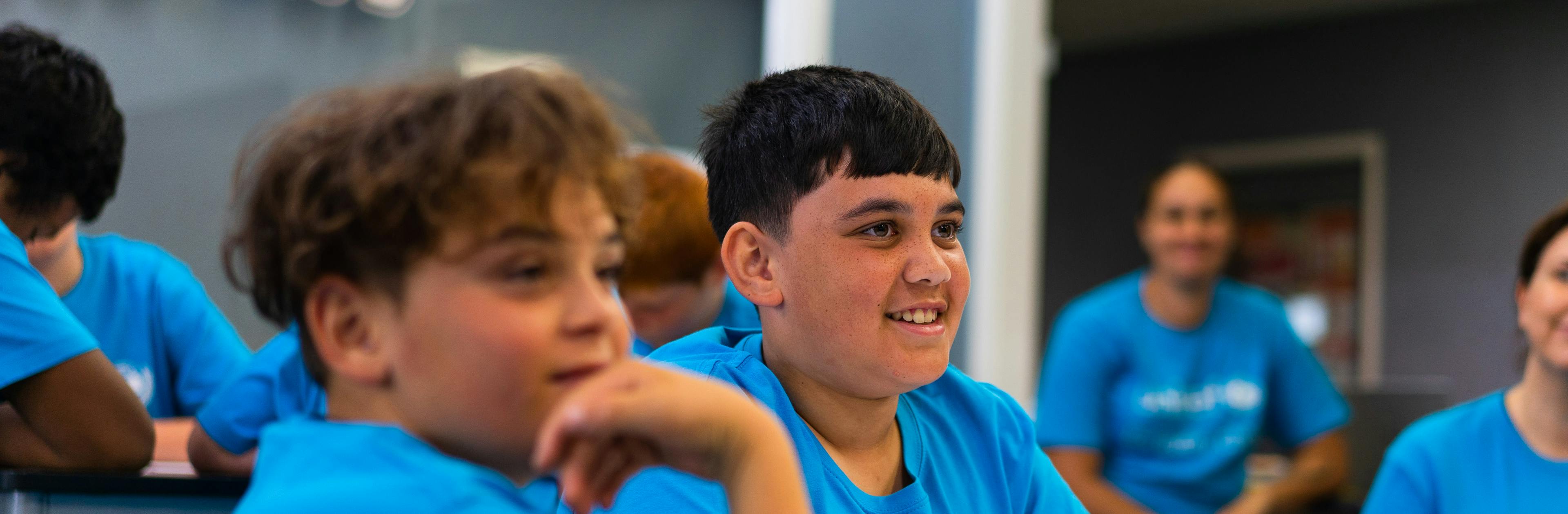 Two boys in a New Zealand school learn about their rights on World Children's Day.