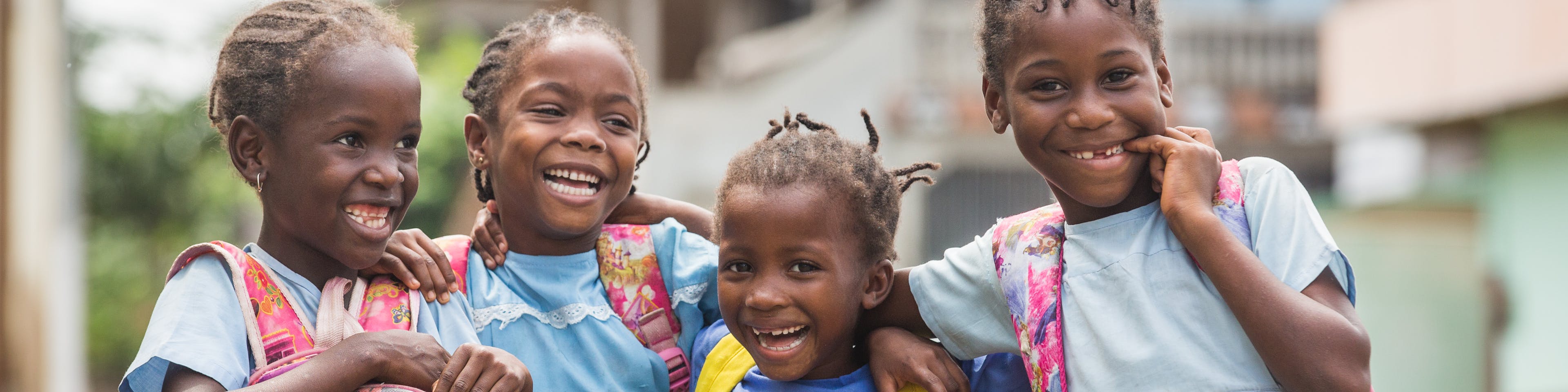 8 December 2020. Sao Tome, Sao Tomé e Principe. Young students laugh on their way back from school.