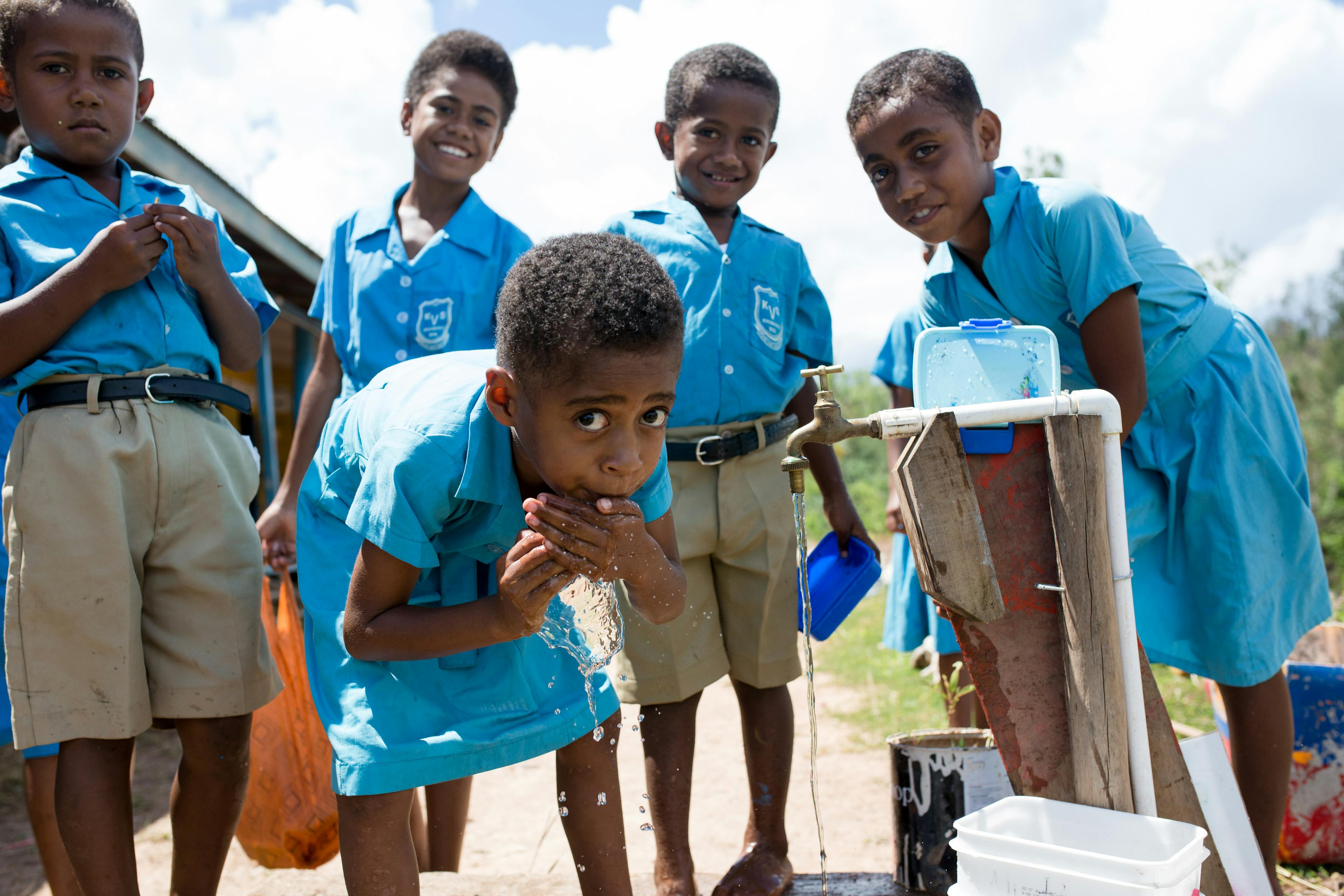 Students of Koroinasolo Village school in Bua, Vanua Levu practice basic hand washing skills during their recess break.