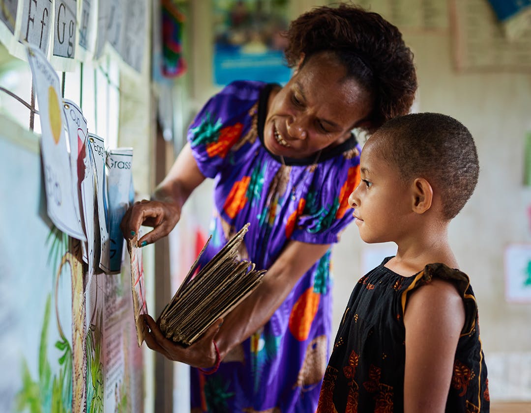 Early Learning Centre Teacher, Kane and five-year-old Phillandrey.