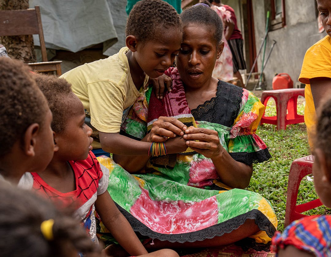 Parents and their children at Bangabulu School during a Parent Support Programme activity. Red Cliff, South Ambae, PENAMA, Vanuatu