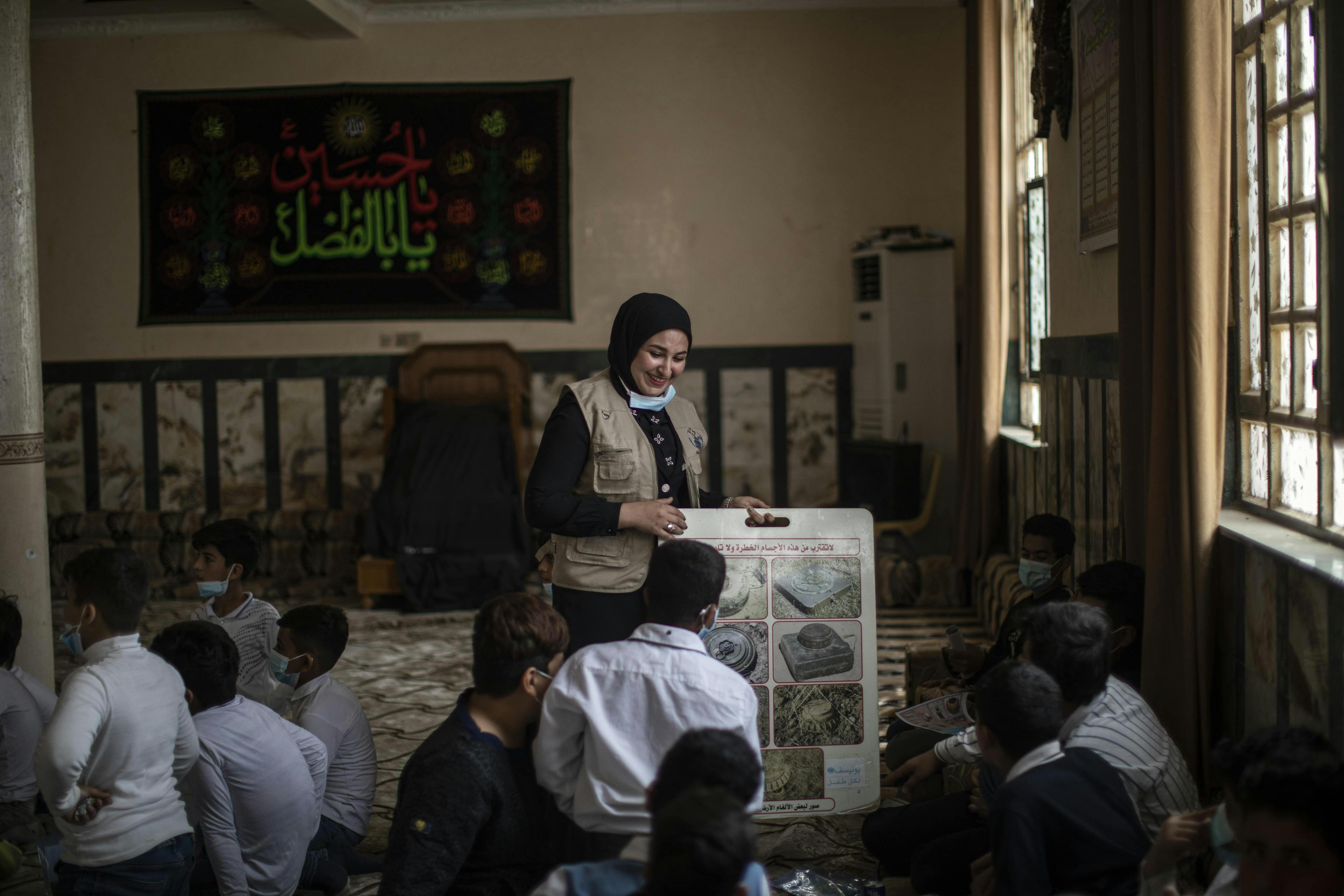 A mine risk training session at a UNICEF-supported child-friendly space located on the outskirts of Basra, in the south of Iraq.