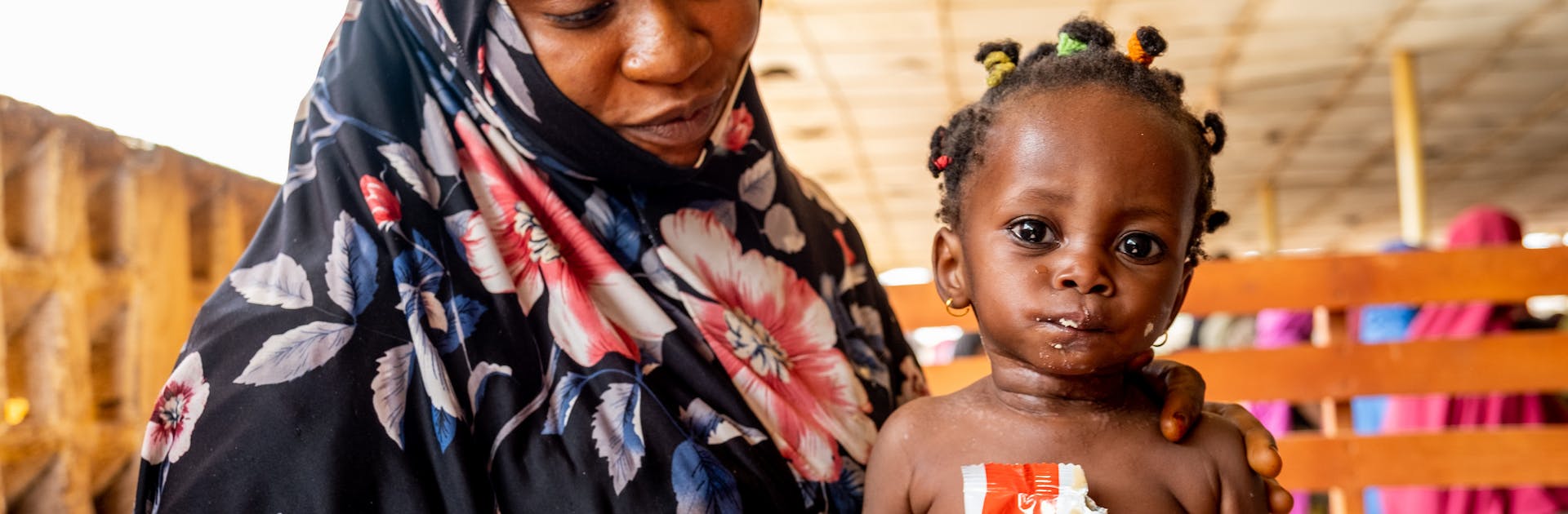 Malnutrition can be deadly for a child like Hafsat. She's eating ready-to-use therapeutic food (RUTF) which is helping save her life.